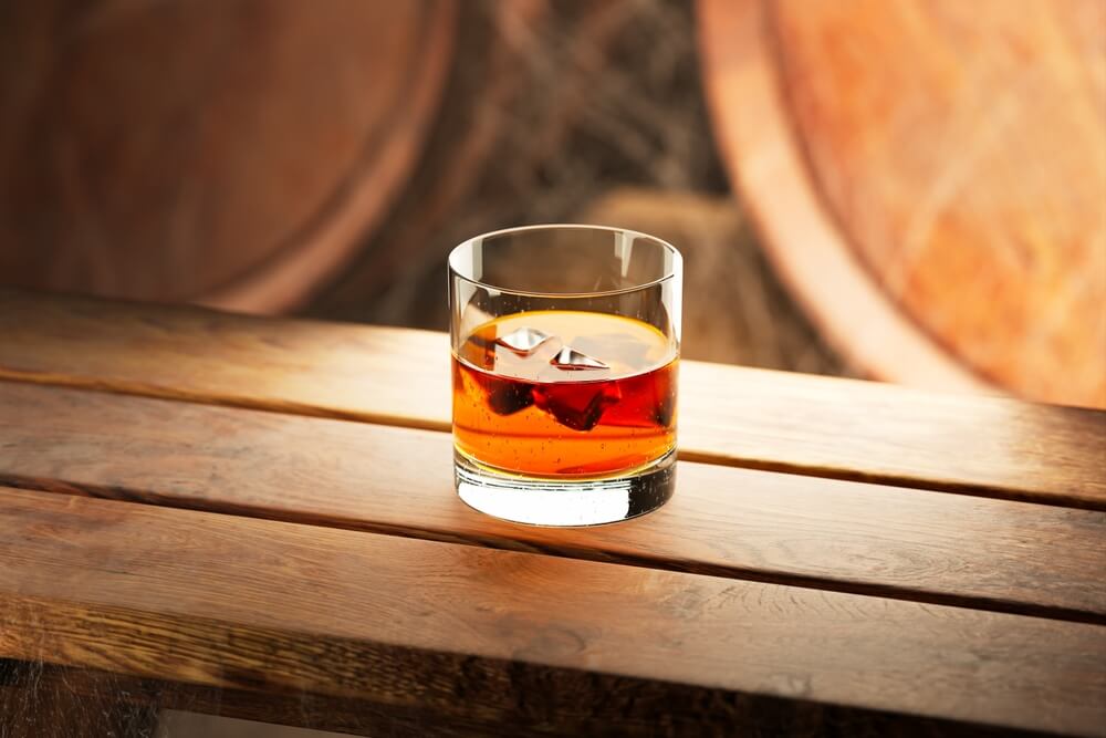 Glass,Of,Fine,Aged,Whiskey,With,Ice,In,Liquid.,Old,