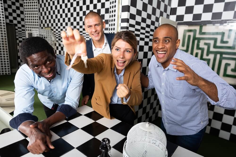 Four,Friends,Of,Different,Nationalities,Solving,Puzzles,In,Quest,Room
